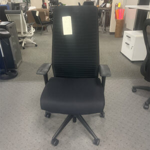 High back black office chair on showroom floor