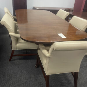 Oval shaped conference table with high back chairs