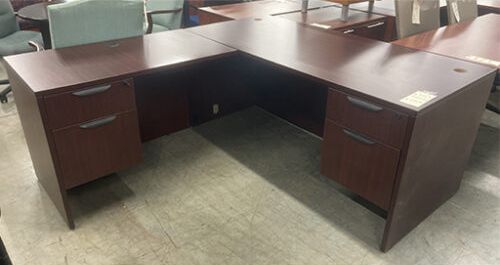 Dark cherry mahogany l-shaped desk with drawers