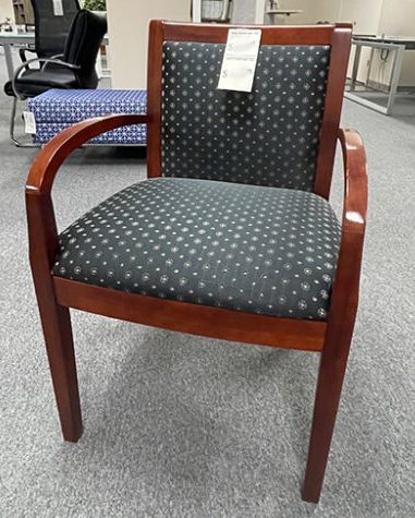 Used mahogany chair for sale with price tag
