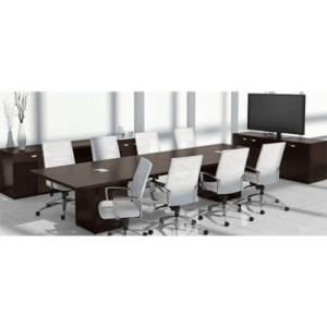 A conference table with white chairs showcased at the Office Furniture Expo in Atlanta, GA.